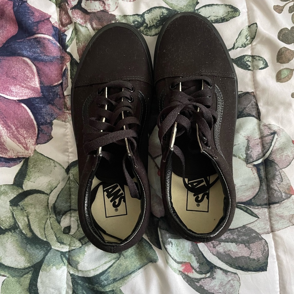 Vans black sneakers size 9w/7m brand new. Never worn. No box or tags